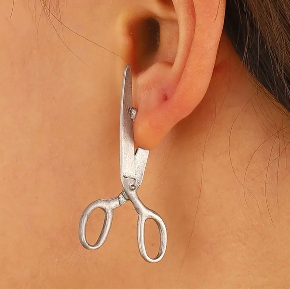 Punk inspired scissors gold tone earrings.
Alloy material - Picture 3 of 3